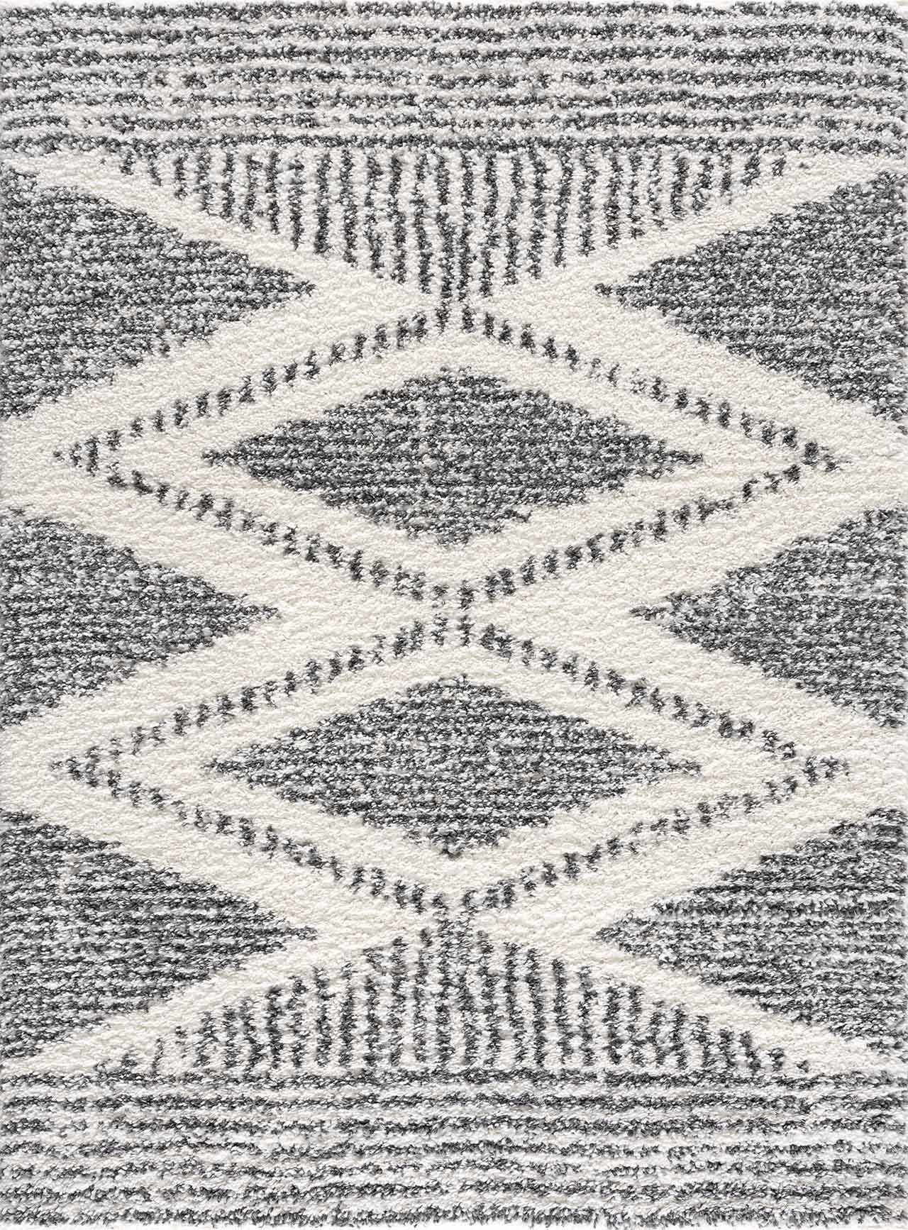 "Close-up of Trunding Plush Area Rug featuring a gray and white geometric diamond design, ideal for transitional home decor."
