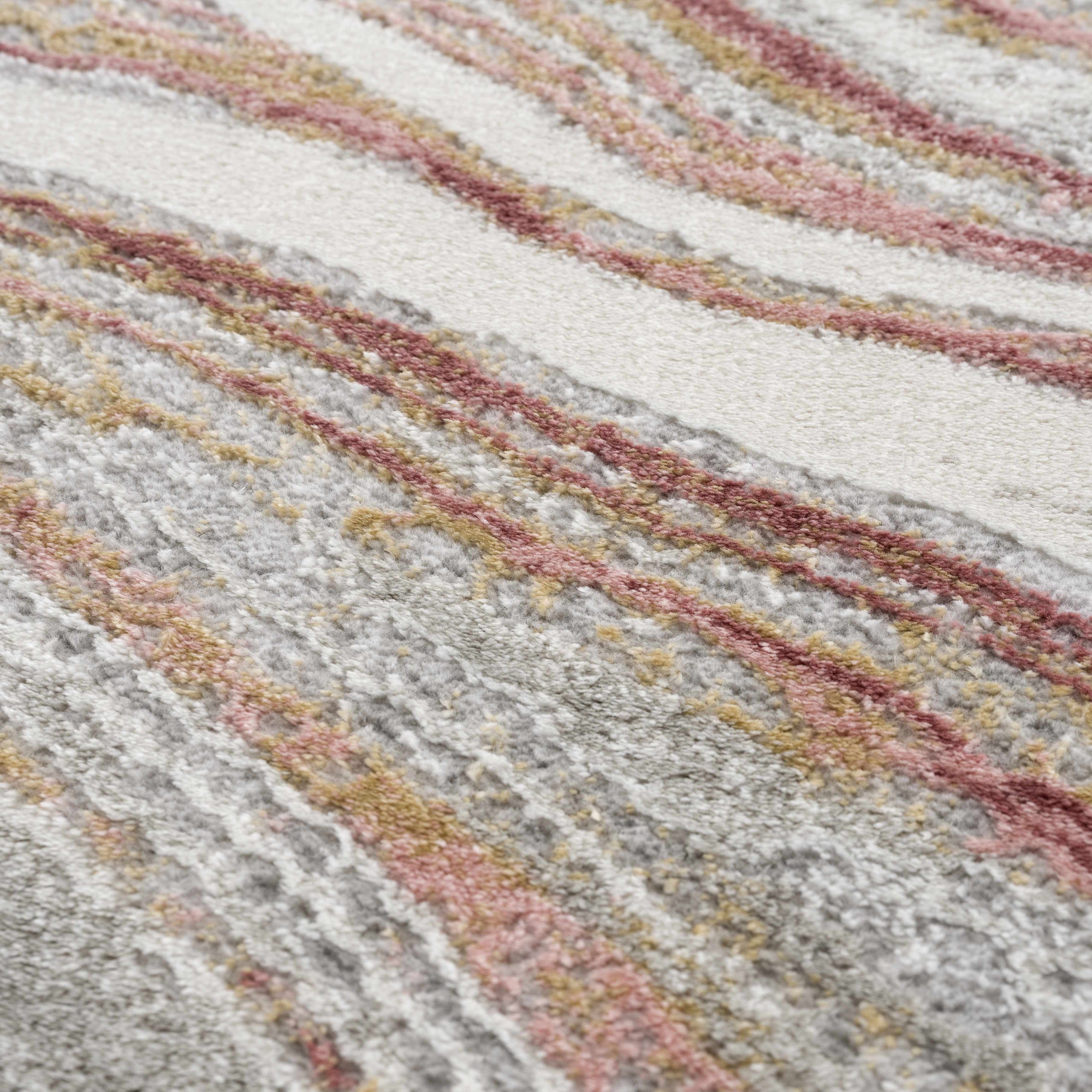 "Close-up texture of Live Marble Pink Rug showing intricate marbled design in pink, gold, and gray. Soft and durable surface."